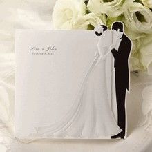 Black and white trifold wedding invitation; bride and groom embossed design